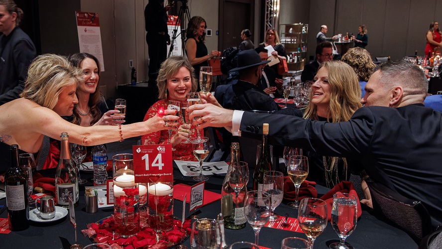 Table of guests toasting